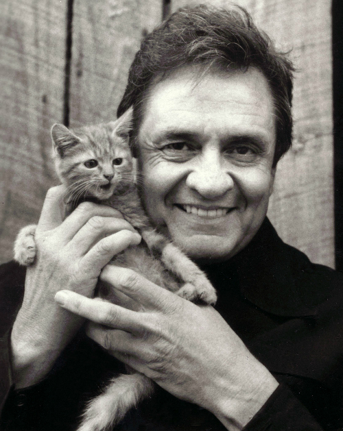 Johnny Cash holding a kitteh.